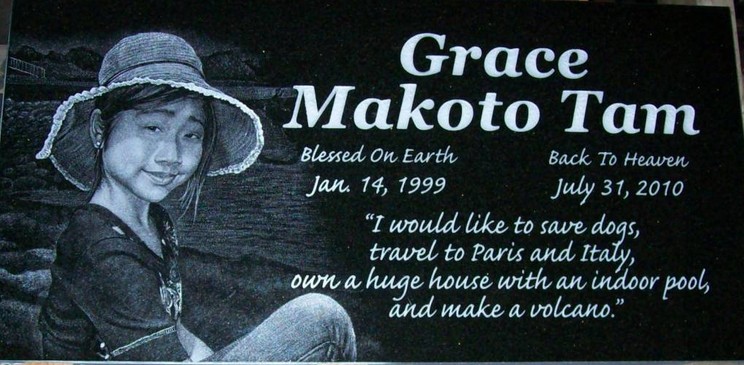 Diamond etched portrait on an Absolute Black granite marker