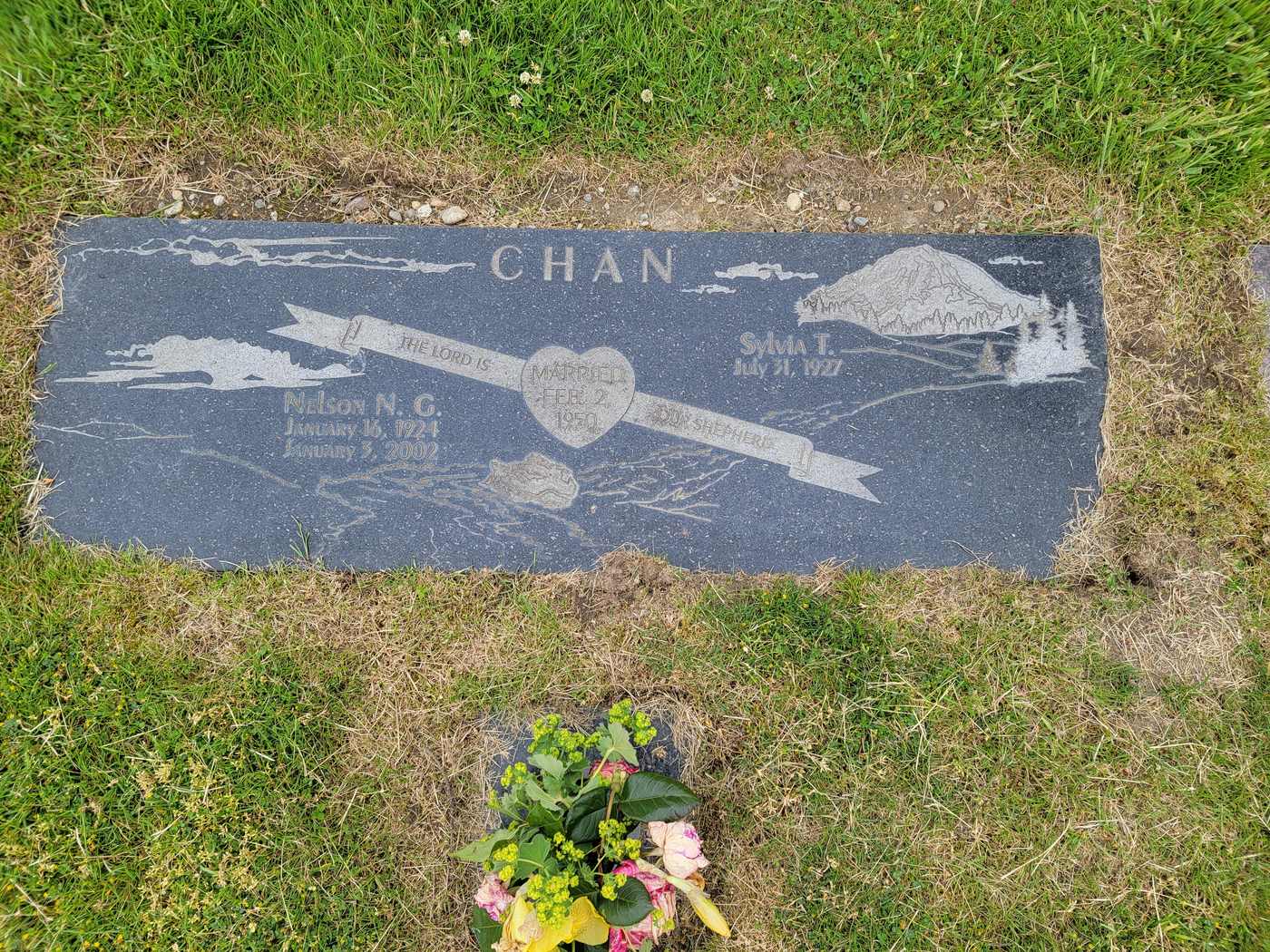 Dark grey granite, etched ribbon and mountain scene