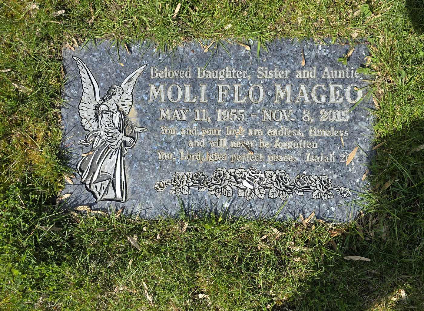 Grey granite with an etched angel
