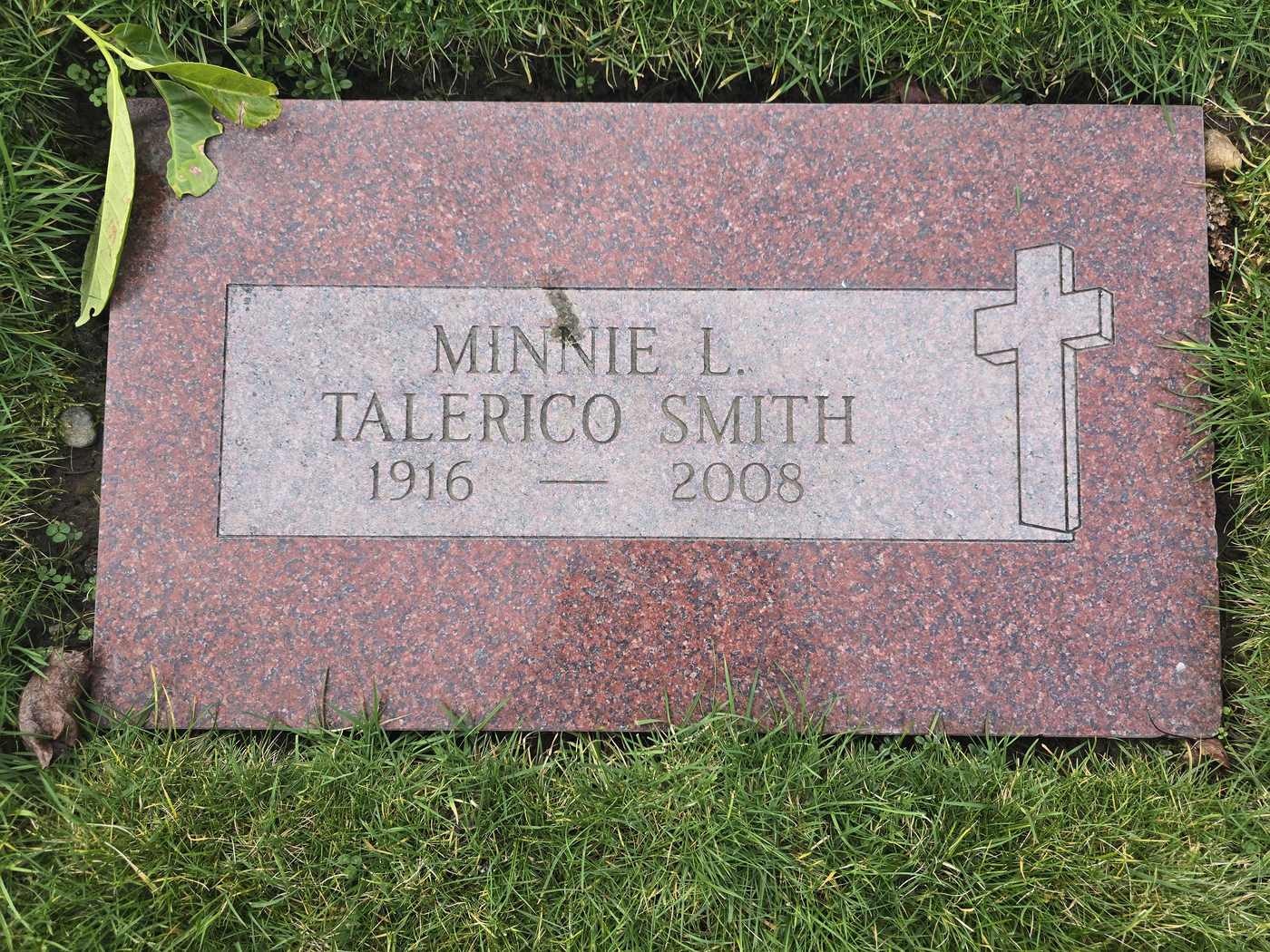 Red granite with a raised cross