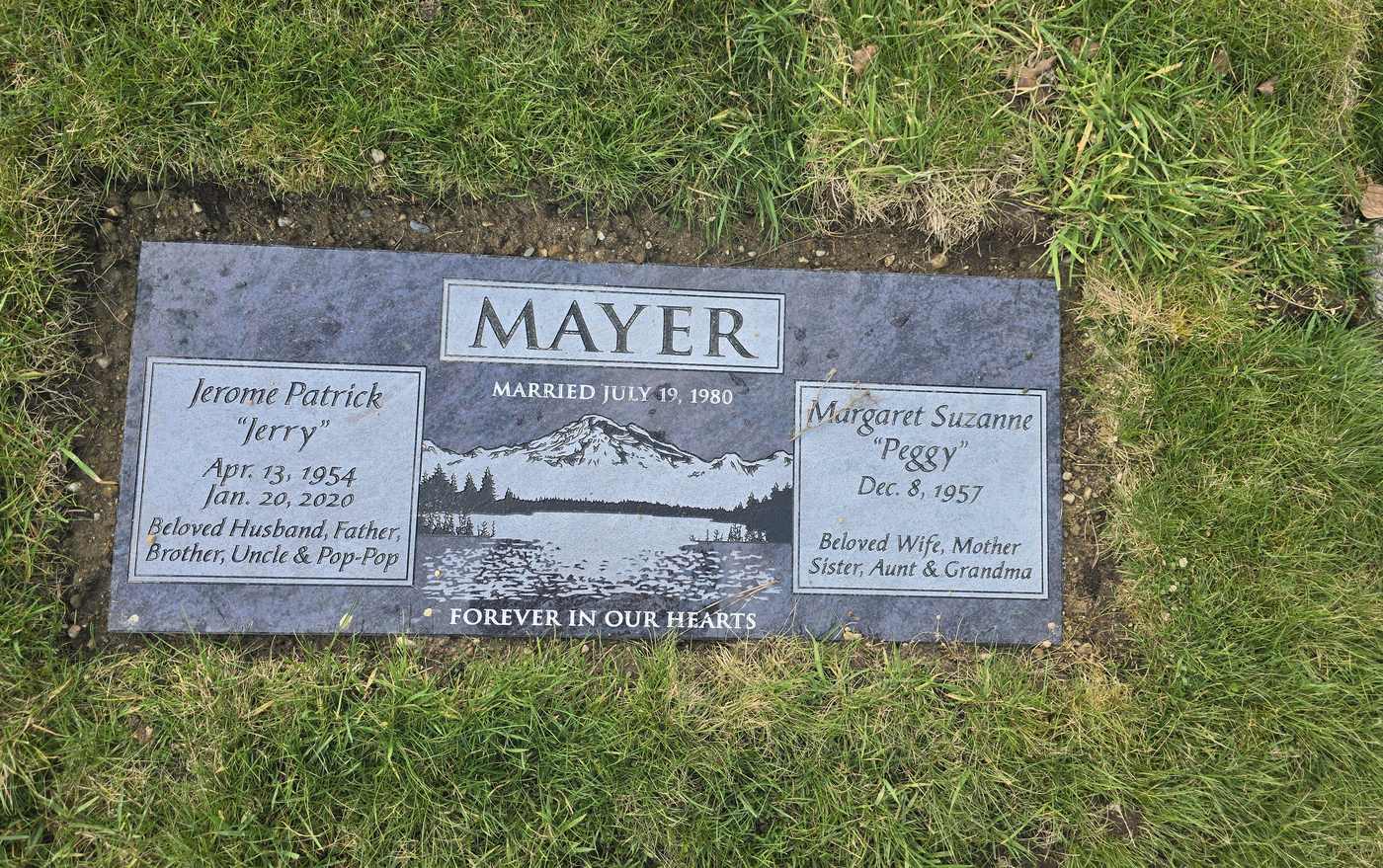 Blue-grey granite companion with a mountain-lake vignette