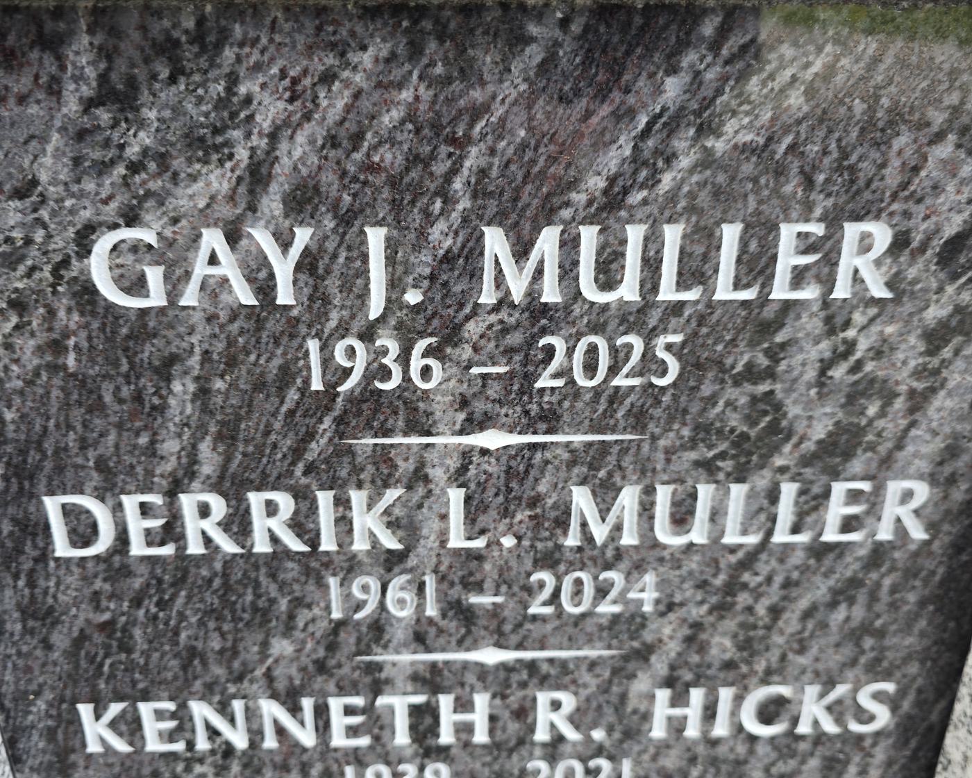 A Rock of Ages niche front engraved with three names and their years, cut into the polished granite and filled in white